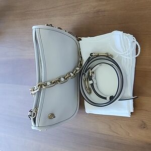 Coach swinger with chain